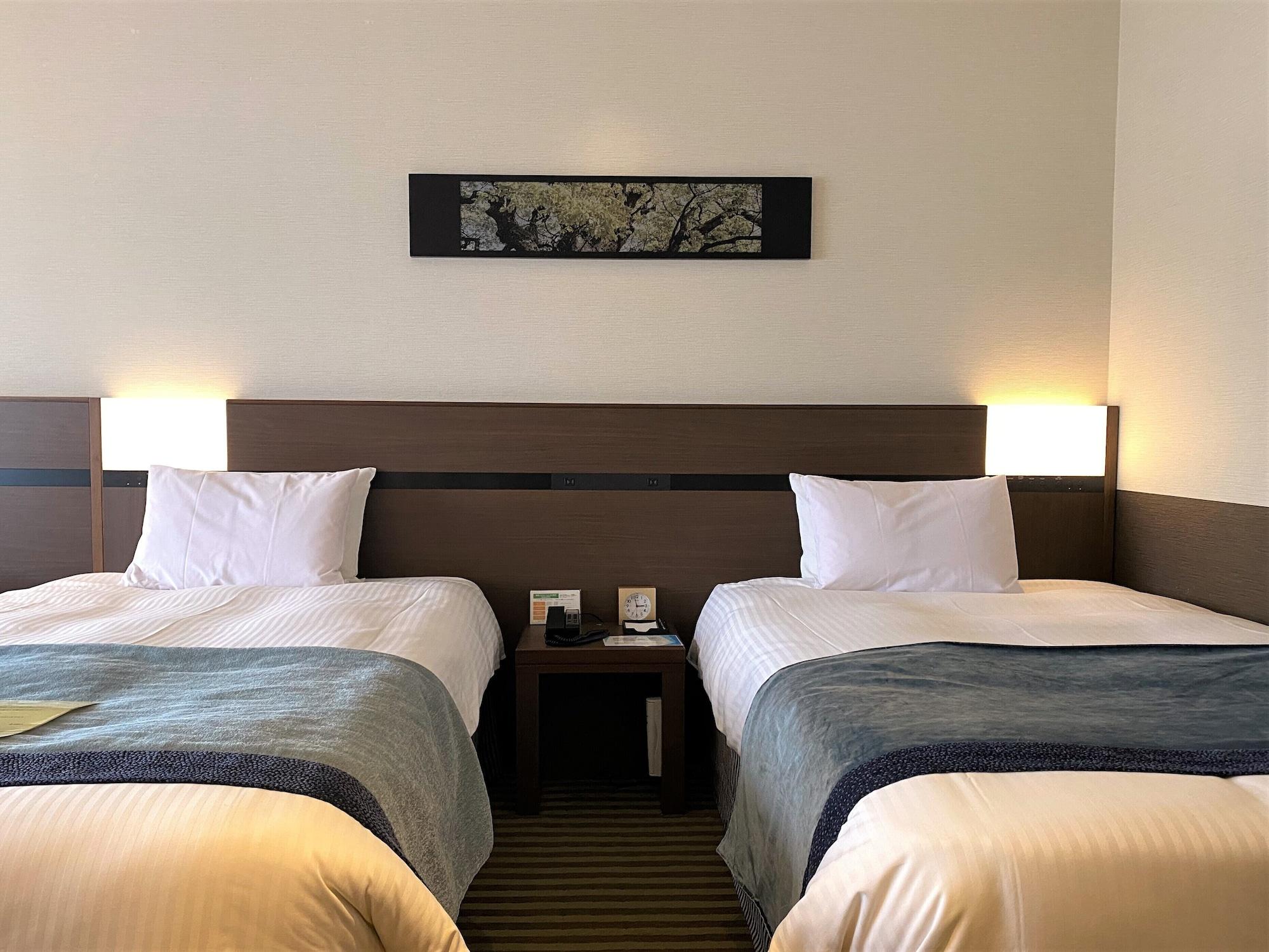 Kobe Portopia Hotel Esterno foto A room at the hotel